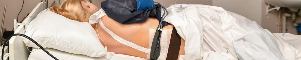 Patient laying on hospital bed