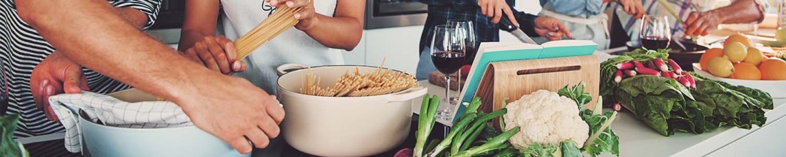 Group of people cooking together