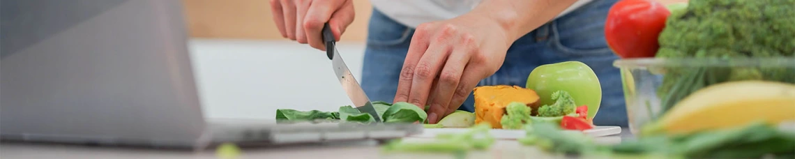 Man following cooking recipe 
