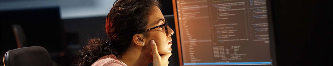 Woman looking at code